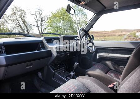 Une Renault Clio mk 1 GT Turbo lors d'une séance photo au pays de Galles avec tous les modèles de la voiture, le 20 octobre 2015 Banque D'Images