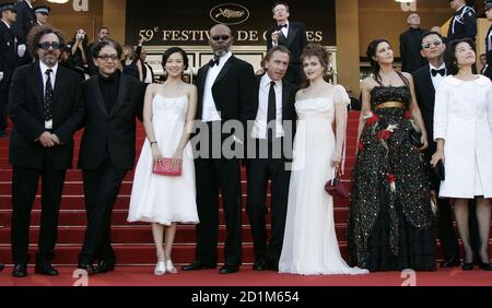 Jury members of the 59th Cannes Film Festival pose on the steps of the Festival Palace May 24, 2006. From left are U.S. director Tim Burton, a member of short film jury, and Palm d'Or members Palestinian director Elia Sulleiman, Chinese actress Zhang Ziyi, U.S. actor Samuel L. Jackson, British actors Tim Roth and Helena Bonham Carter, Italian actress Monica Bellucci, and jury president Wong Kar Wai and guest. At rear center is jury member and French director Patrice Leconte.
