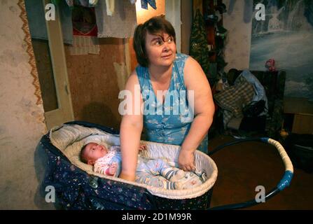 Nadia Khalina Possibly The World S Fattest Baby Lies In A Pram With Her Mother Tatyana L Father Viktor R And Her Siblings In Their Apartment In The Siberian City Of Aleisk October