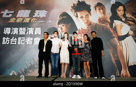 Director James Wong Poses With Cast Members Justin Chatwin Of Canada Emmy Rossum Of The U S
