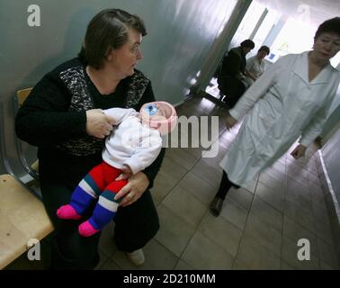 Tatyana Khalina Holds Her Baby Nadia Possibly The World S Fattest Baby Outside Their Apartment In The Siberian City Of Aleisk October 26 07 Tatyana Gave Birth On September 17 To Nadia Who