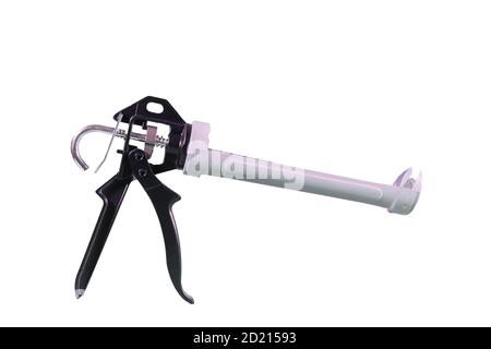 Pistolet à colle en silicone. Pistolet à calfeutrer isolé sur blanc. Pour travailler avec de l'adhésif, du silicone et d'autres matériaux de remplissage de construction. Banque D'Images