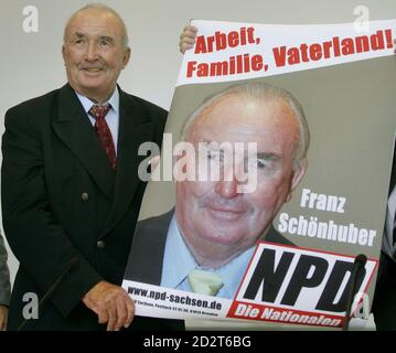 Schoenhuber Of The Far Right German Npd Displays Election Campaign Poster In The Eastern German City Of Dresden Franz Schoenhuber Year Old Successor Of Late German Far Right National Democratic Party Npd Candidate