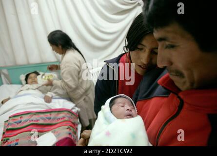 Peruvian Mary Luz Rojas Holds Her Daughter Rous Naomi Whom She Gave Birth To In The Vertical Position At The Belempampa Health Clinic In Cuzco May 24 08 Belempampa Is One Of
