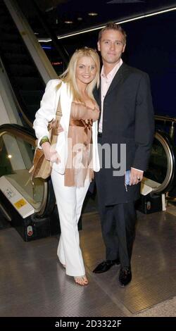 L'actrice Danniella Westbrook et son mari Kevin Jenkins arrivent au Warner Village Cinema dans le West End de Londres, pour la première britannique de 2 Fast 2 Furious. Banque D'Images