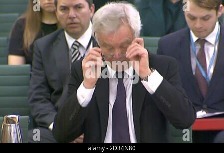 Brexit Secrétaire David Davis fait preuve sur l'évolution de l'Union européenne parle de divorce aux Communes de quitter le Comité de l'UE dans la région de Portcullis House, Londres. Banque D'Images