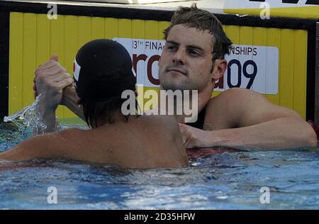 Liam Tancock, en Grande-Bretagne, après avoir remporté la course de dos de 50 m masculin lors des Championnats du monde de natation de la FINA à Rome, en Italie. Banque D'Images