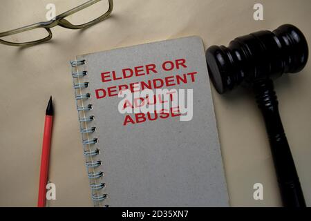 The Book of Elder or Dependent Adult Abuse on office. Banque D'Images