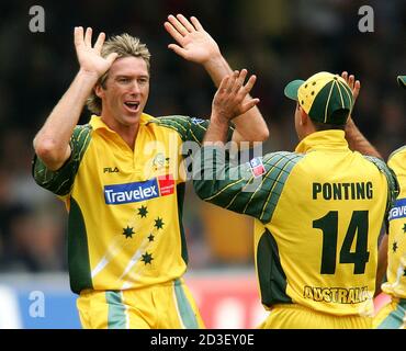 England's Flintoff is bowled by Australia's McGrath during their one-day cricket final against Australia at Lords cricket ground in London. England's Andrew Flintoff (L) is bowled by Australia's Glenn McGrath (2nd L) England's Flintoff is bowled by Australia's McGrath during their one-day cricket final against Australia at Lords cricket ground in London. England's Andrew Flintoff (L) is bowled by Australia's Glenn McGrath (2nd L)