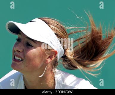Russia's Wimbledon champion Maria Sharapova serves during training in Seoul September 27, 2004. Sharapova is in Seoul to participate in Hansol Korea open Tennis Championships on September 27 - October 3, 2004. REUTERS/Lee Jae-Won  LJW/LA