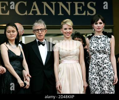 Woody Allen poses with wife and cast of "Match Point" during red carpet arrivals for screening at 58th Cannes Film Festival. U.S. di
rector Woody Allen (2nd L) poses with his wife Soon