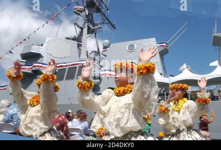 The Uss Chung Hoon Sits Ready To Be Placed In Active Service While Members Of Halau Hula Olana Ai Dance During Its Commissioning Ceremony On Ford Island At Pearl Harbor Hawaii September 18