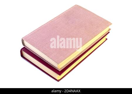 pile de deux livres isolée sur fond blanc Banque D'Images