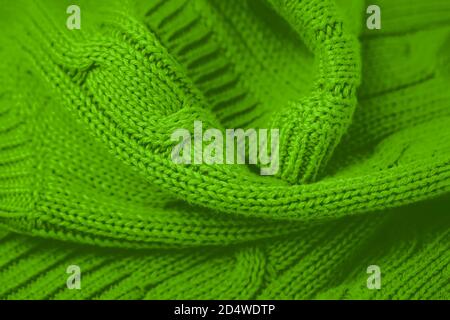 Arrière-plan de couleur verte. Photo plein format de tissu tricoté Banque D'Images
