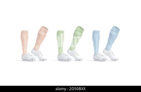 Blank white soccer boots with colored socks mockup on tiptoe Banque D'Images