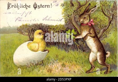 Glückwunsch Ostern, Küken schlüpft aus EI, Osterhase mit Kleeblatt | utilisation dans le monde entier Banque D'Images