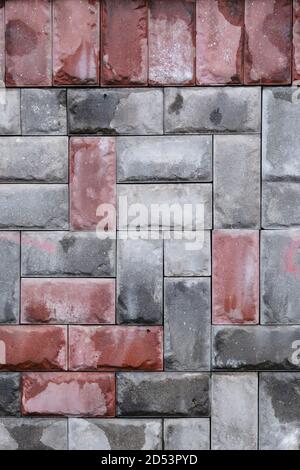 Carreaux muraux gris et rouge humide, texture Banque D'Images