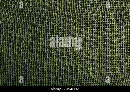 Photo de texture d'un foulard en filet vert. Banque D'Images