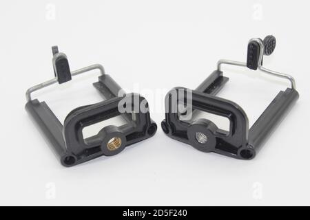 Une photo du support de trépied mobile sur fond blanc Banque D'Images