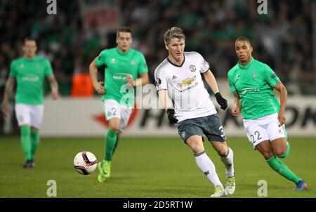 Bastian Schweinsteiger (centre) de Manchester United en action Banque D'Images