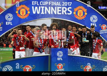 Les joueurs de Manchester United fêtent après le coup de sifflet final Banque D'Images