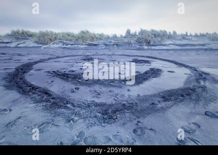 Nouvelle-Zélande, Île du Sud, Hokitika, smiley face dans le sable Banque D'Images