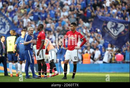 Chris Smalling (à droite) de Manchester United est abattu après le match Banque D'Images