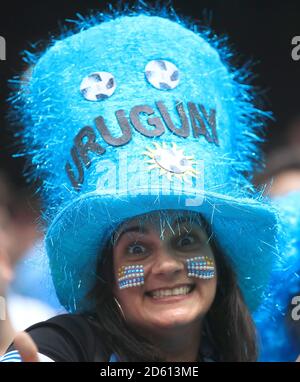 Un fan de l'Uruguay montre son soutien dans les tribunes à venir de la correspondance Banque D'Images