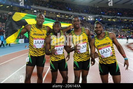 Photo du fichier : Usain Bolt essaie pour l'équipe de football australienne Central Coast Mariners. La Jamaïque (de gauche à droite) Usain Bolt, Nickel Ashmeade, Kemar Bailey Cole et Jason Livermore célèbrent la victoire du relais hommes 4x100m ... Sport - Jeux du Commonwealth 2014 - jour dix ... 02-08-2014 ... Glasgow - Hampden Park ... Royaume-Uni ... Le crédit photo devrait se lire comme suit : EMPICS Sport/EMPICS Sport. Référence unique n° 20559040 ... Banque D'Images