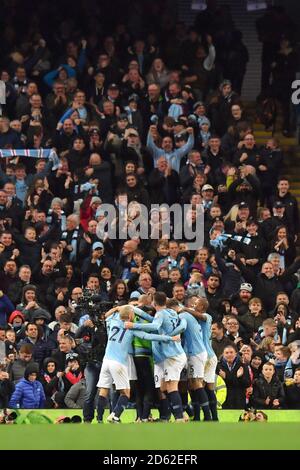 Manchester City's Ilkay Gundogan célèbre marquant son troisième but de côtés du jeu Banque D'Images