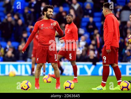 Mohamed Salah de Liverpool et Roberto Firmino de Liverpool se réchauffent avant le match Banque D'Images