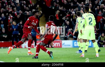 Le Divock Origi de Liverpool célèbre le quatrième but de son camp le jeu Banque D'Images