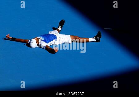 JO-Wilfried Tsonga célèbre sa victoire contre Andy Murray en Grande-Bretagne Au cours du 1er tour de l'Open d'Australie Banque D'Images