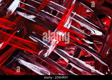 Traits de pinceau rouge, blanc et noir. Arrière-plan abstrait expressif. Texture dessinée à la main Banque D'Images