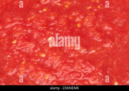 Texture du jus de tomate cru, en cours de cuisson Banque D'Images