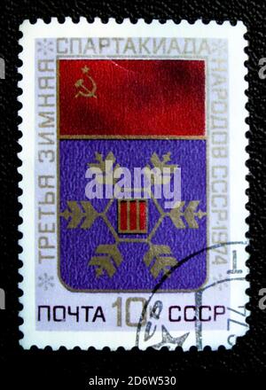 Moscou, Russie - le 7 janvier 2017 : un timbre imprimé en URSS montre le logo du troisième hiver spartakiades, vers 1974 Banque D'Images