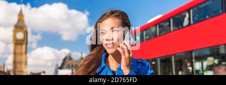 Londres touriste asiatique femme parlant sur la bannière de téléphone. Femme d'affaires urbaine qui appelle le téléphone portable, le bus rouge et Big Ben, le Parlement en milieu urbain. Europe Banque D'Images