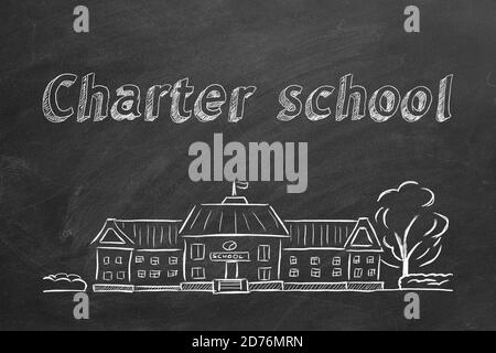 Bâtiment de l'école et lettrage de l'école de charte sur le tableau noir. Esquisse dessinée à la main. Banque D'Images