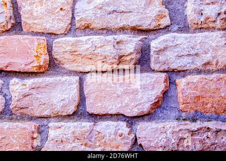 Mur en pierre naturelle orange clair avec effet 3d Banque D'Images