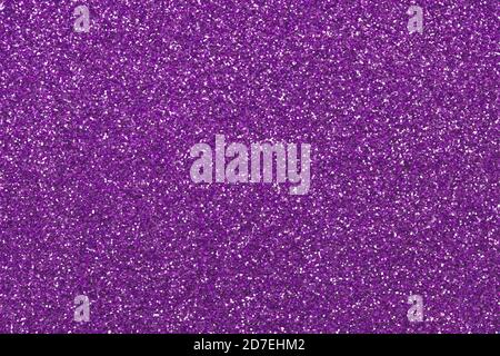 Texture en tissu violet étincelant, fonds en papier de Noël. Surface pailletée violet foncé. Motif de grain abstrait. Décoration de fête. Paillettes brillantes. Hai Banque D'Images