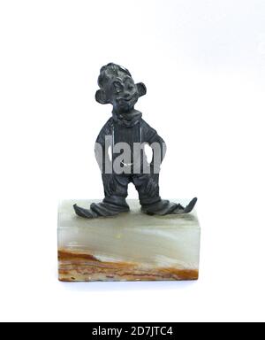 Photo d'une petite main de figurine Clown faite de étain sur une base en marbre de GI. Edo vue avant d'un fabricant italien Banque D'Images