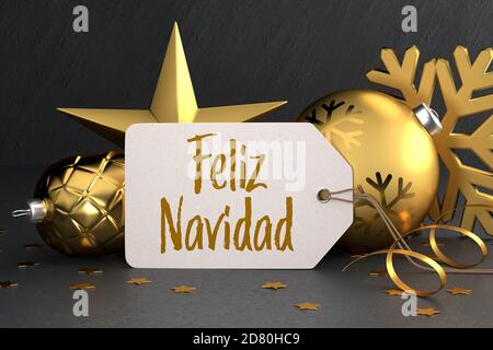 Noël - étiquette cadeau avec le message espagnol « Feliz Navidad » (Joyeux Noël) sur un fond de pierre noire, appuyé contre un noël doré réf Banque D'Images