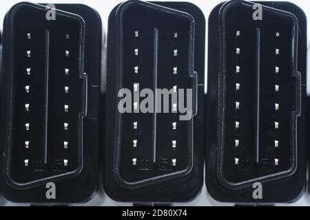 Connecteur de voiture. Lecteur de voiture professionnel OBDII. Connecteur de prise pour le diagnostic du véhicule. Arrière-plan de la vue de dessus Banque D'Images