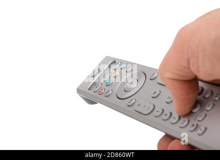 Télécommande argentée à pression manuelle isolée sur fond blanc. Télécommande de téléviseur argent en gros plan isolé à la main. Banque D'Images