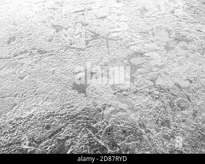 Macro-plan de texture d'une chute d'eau gelée de lac de rivière en Norvège. Banque D'Images