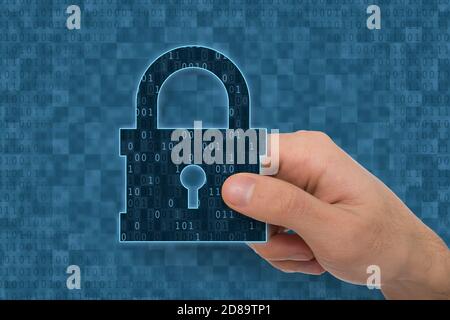 Illustration d'un cadenas fermé à main avec une icône en forme de trou de serrure Banque D'Images