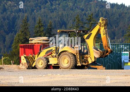 Chargeuse-pelleteuse sur le chantier de construction Banque D'Images