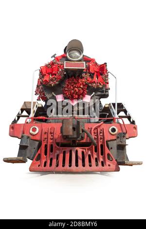 Vieille locomotive à vapeur avec les décorations rouges isolées sur fond blanc, vue de face. Banque D'Images