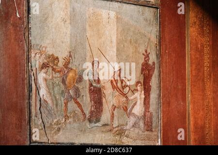 Pompéi, Italie. Fresques anciennes dans le mur de l'ancien bâtiment Banque D'Images