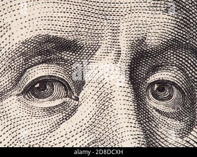 Benjamin Franklin yeux macro extrême sur nous 100 dollars de facture, les États-unis de l'argent de closeup Banque D'Images